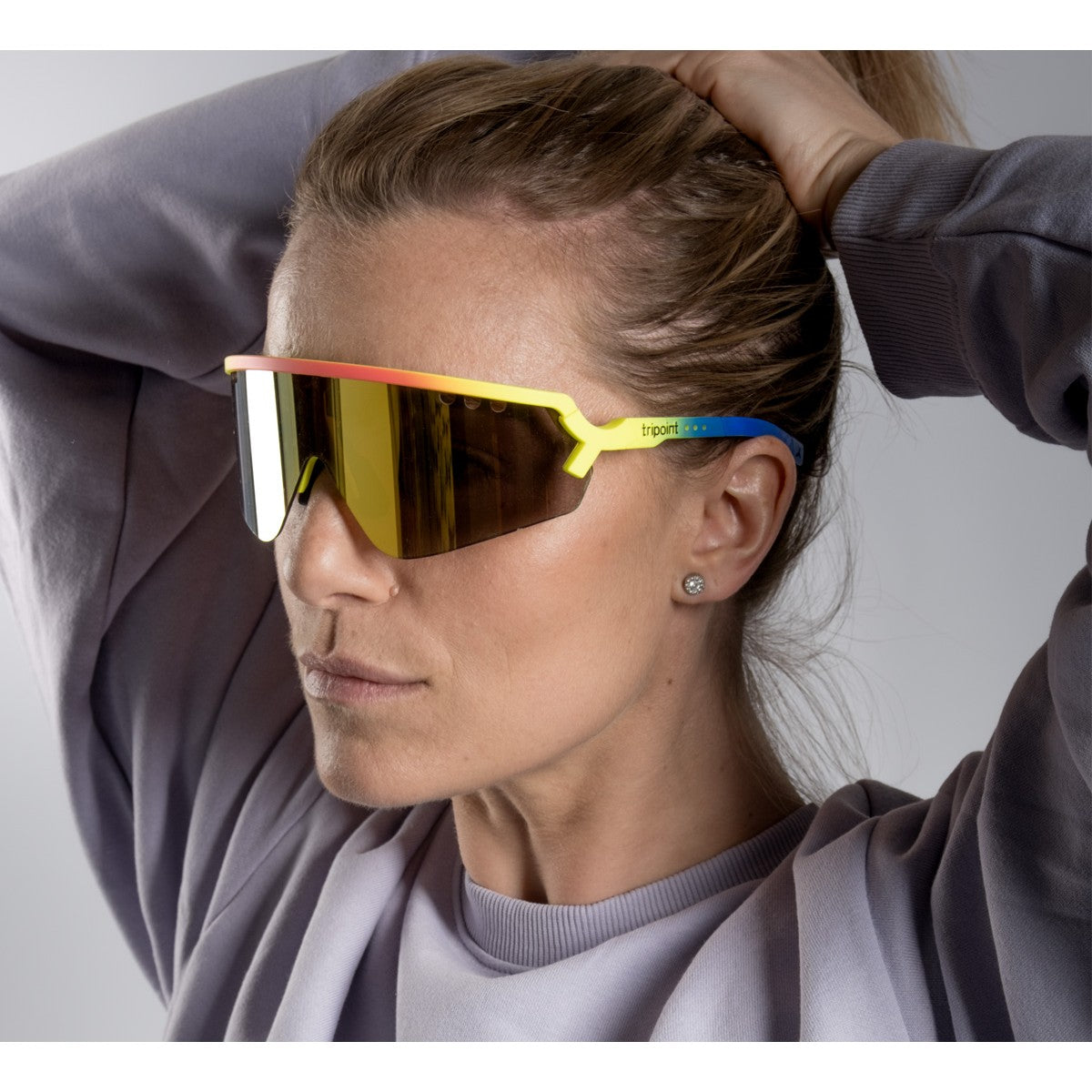 Model wearing yellow tripoint 007 chobe sunglasses