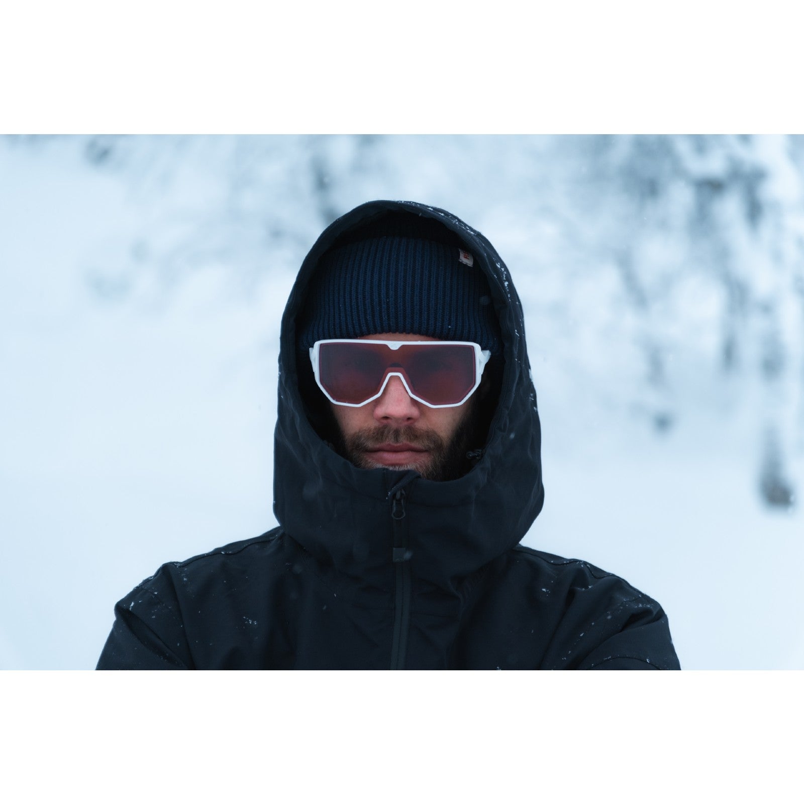 Skiier wearing tripoint 003 reschen sunglasses