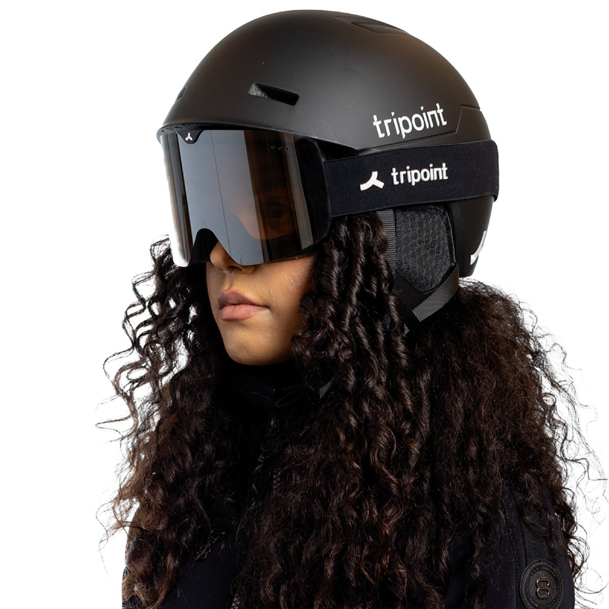 Model wearing black tripoint 202 MIPS ski/snowboard helmet